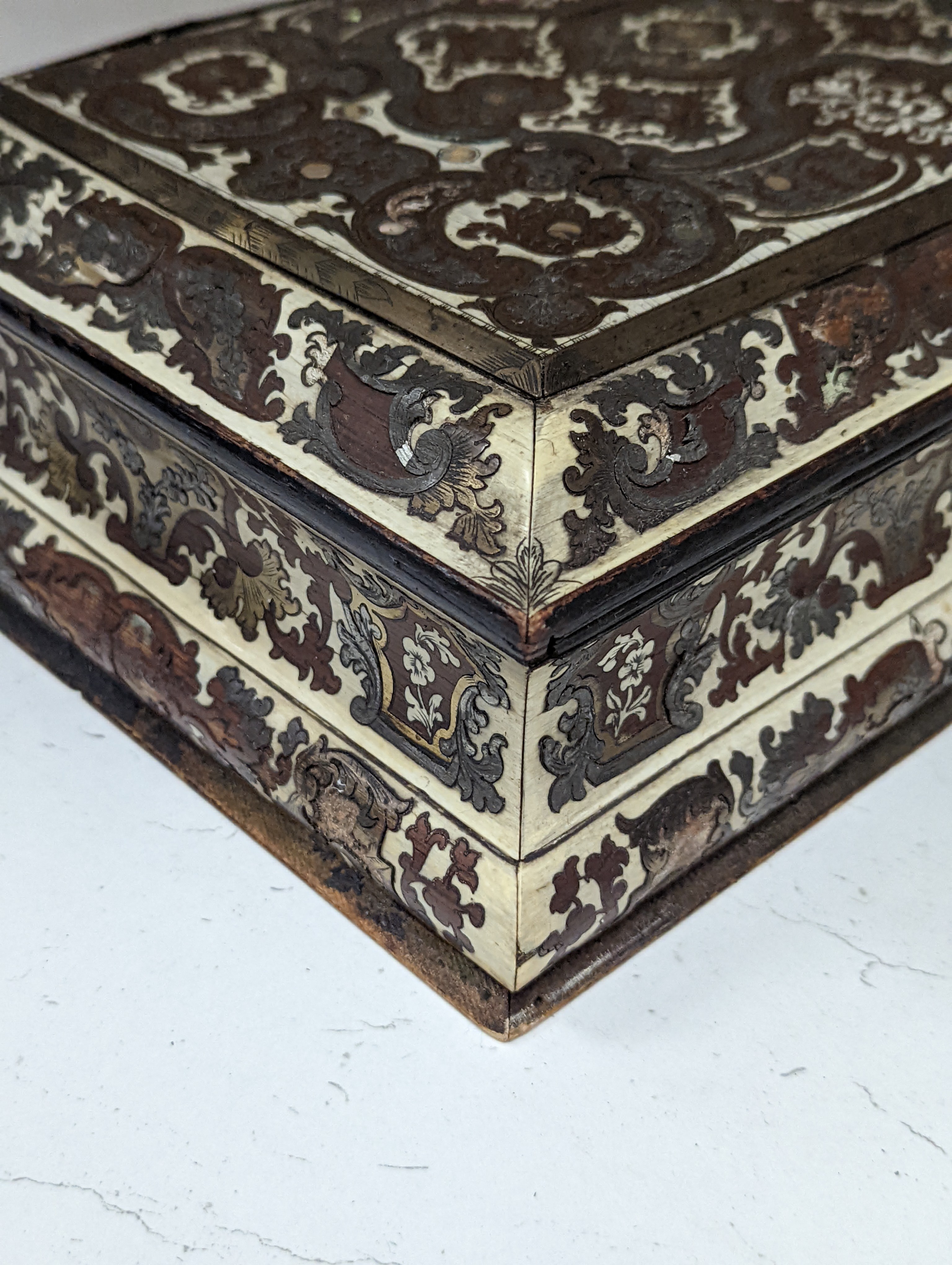 A 19th century French cut brass pewter and ivory inlaid jewellery box, h 10cm, 27 x 19cm, together with a parquetry box (2)